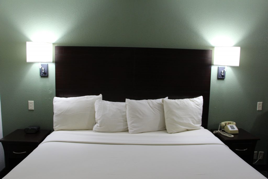 Guest room at Regency Inn & Suites in Pittsburg, Kansas