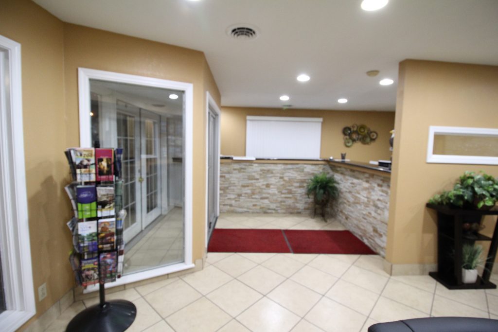 Front desk and lobby at Regency Inn & Suites